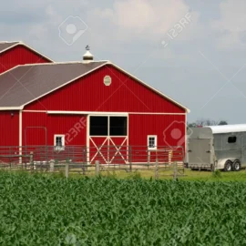 27761084-red-horse-barn-and-trailer